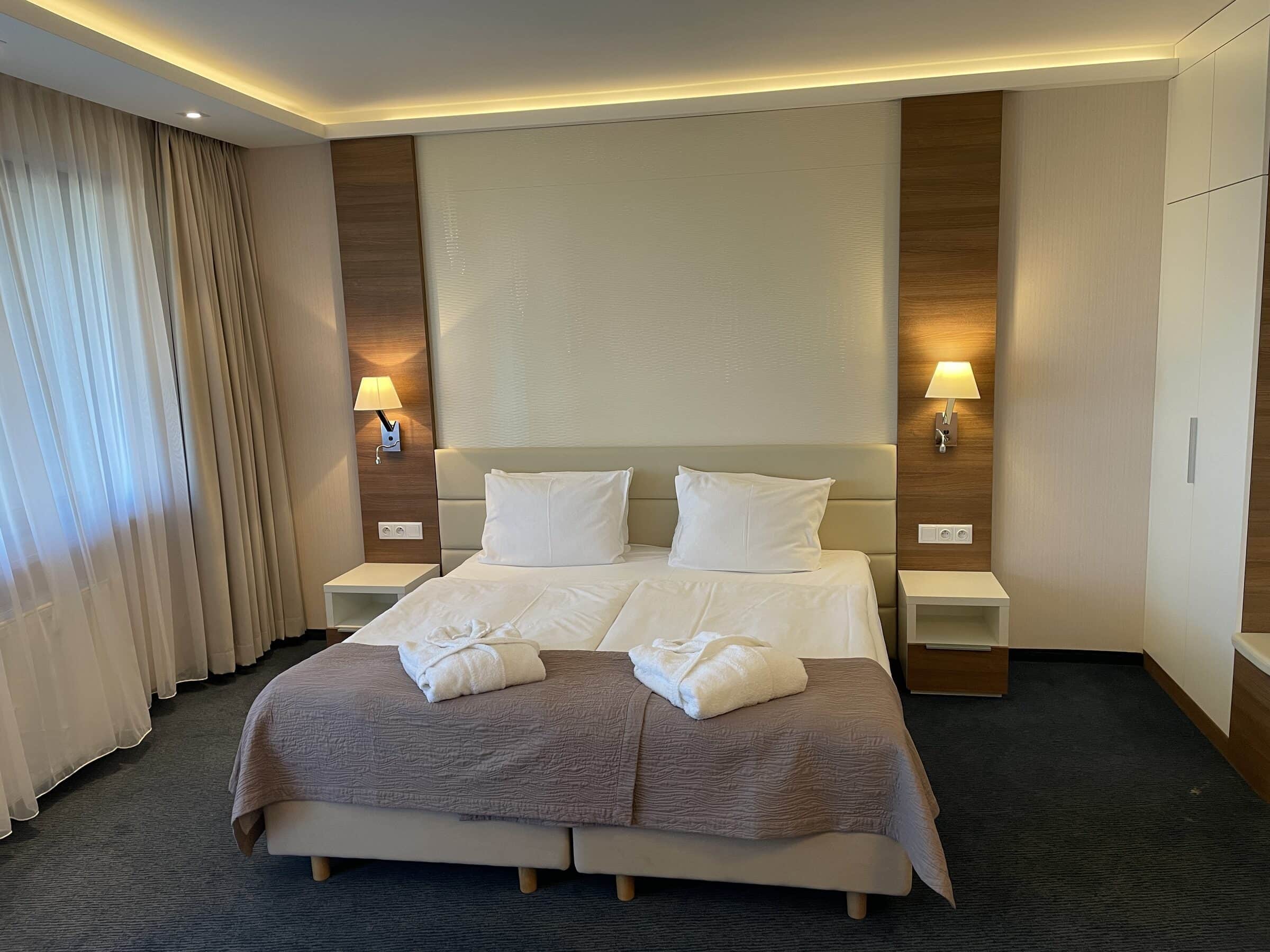 Wide bed in Apartament Zdrojowy 323 at Hotel Dom Zdrojowy with hotel-grade bedding